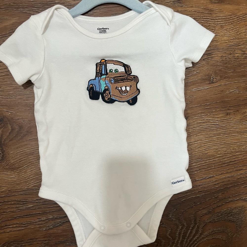 Gerber White Baby Onesie with Cars Pixar Matter Truck Graphic